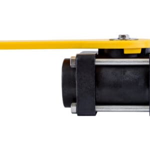 A yellow handle is on the side of a ball valve.