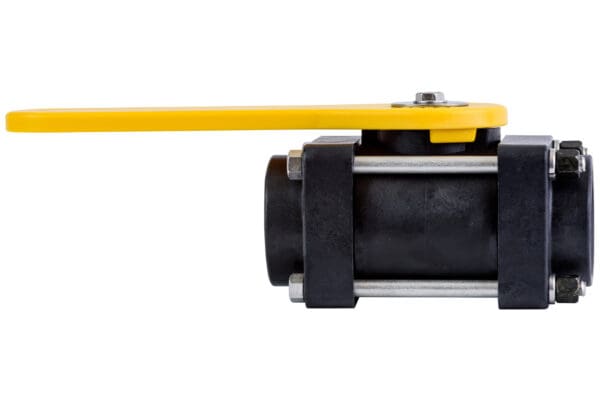 A yellow handle is on the side of a ball valve.