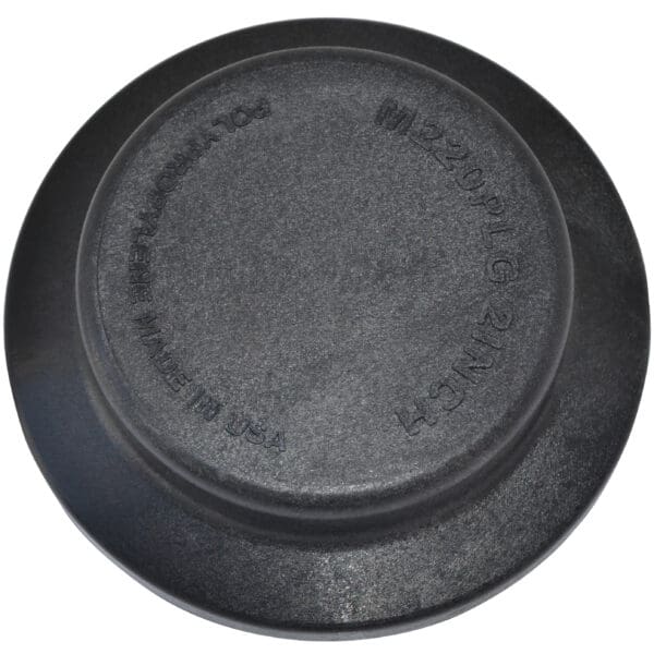 A black plate with the word " pancake " written on it.