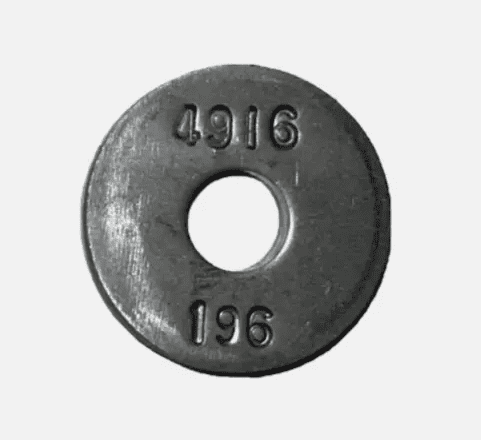 A metal washer with the number 4 0 1 6 and date of 1 9 6.